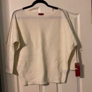 Women’s cream colored long sleeve top